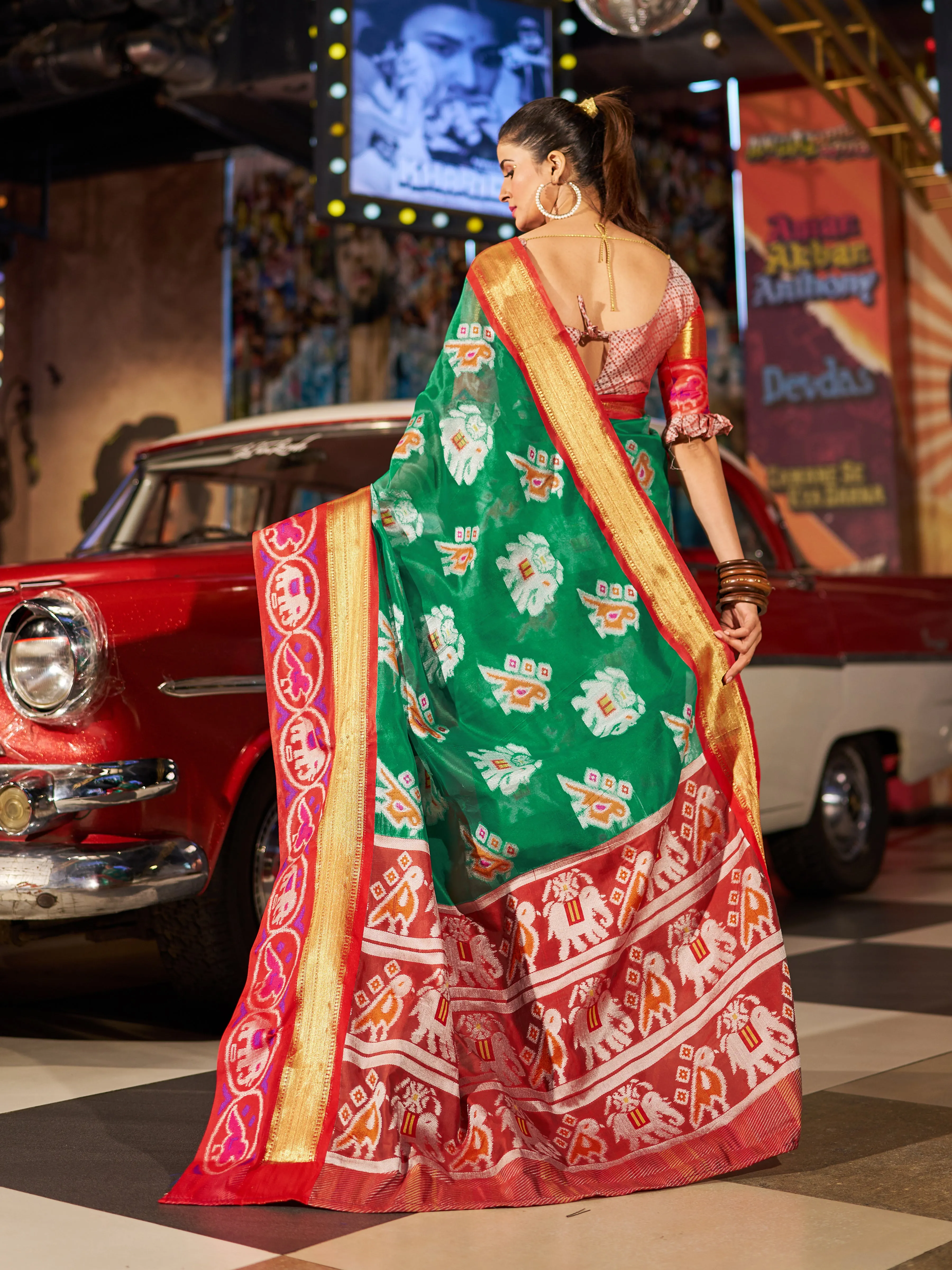 Enchanting Green Patola Silk Saree with Exquisite Weaving Work