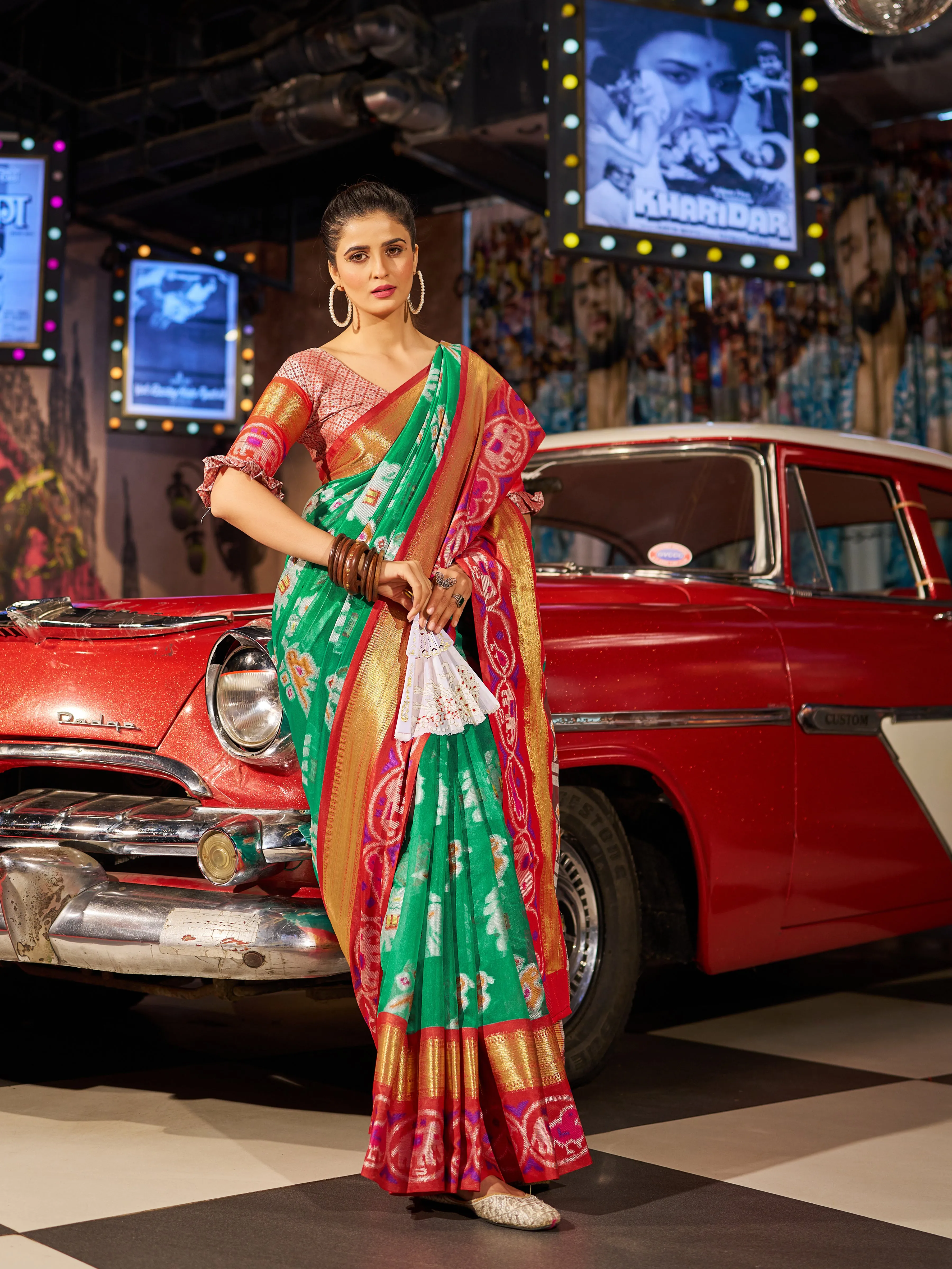 Enchanting Green Patola Silk Saree with Exquisite Weaving Work