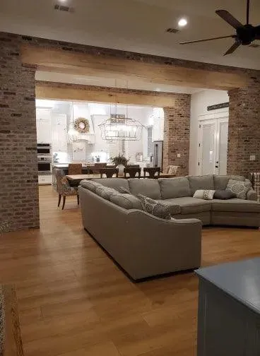 Spacious 4-Bedroom Home Plan with Bonus Room and Porches