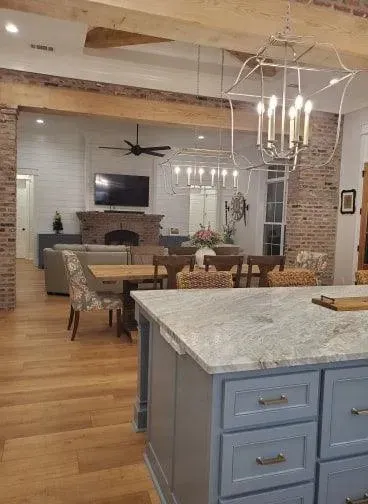 Spacious 4-Bedroom Home Plan with Bonus Room and Porches