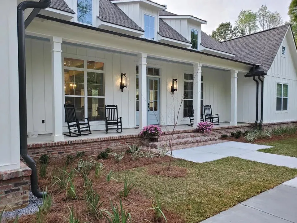 Spacious 4-Bedroom Home Plan with Bonus Room and Porches