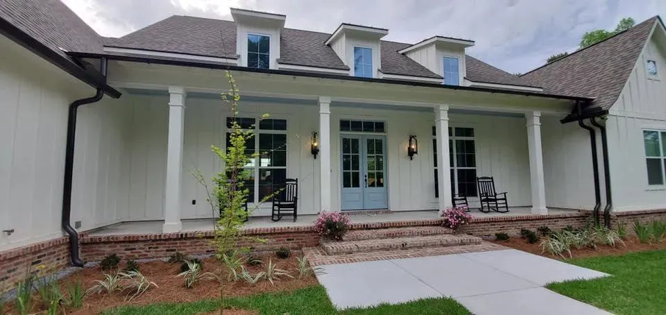 Spacious 4-Bedroom Home Plan with Bonus Room and Porches